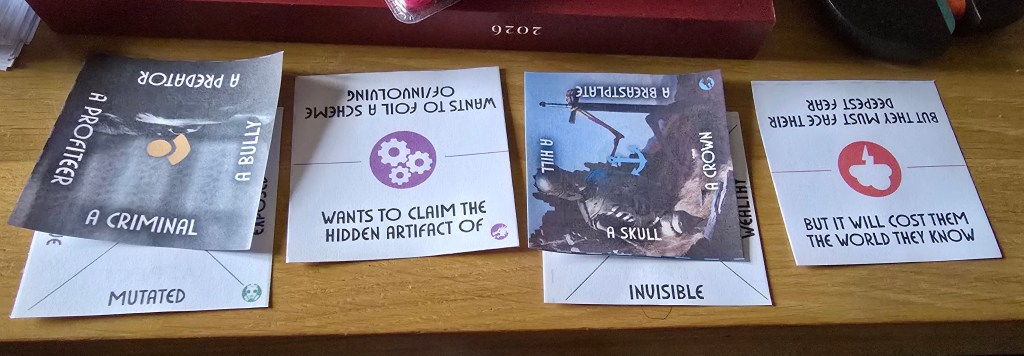 Cards showing "a mutated criminal wants to claim the hidden artifact of an invisible skull but it will cost them the world they know"